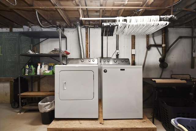 laundry area featuring laundry area and washer and clothes dryer