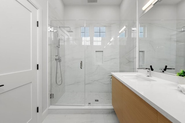 130 Cushing St Unit Ph1, Cambridge, MA 02138 - bathroom with vanity and a marble finish shower