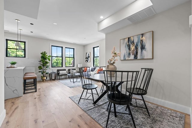 130 Cushing St Unit Ph1, Cambridge, MA 02138 - dining space with plenty of natural light, light wood-style floors, and recessed lighting