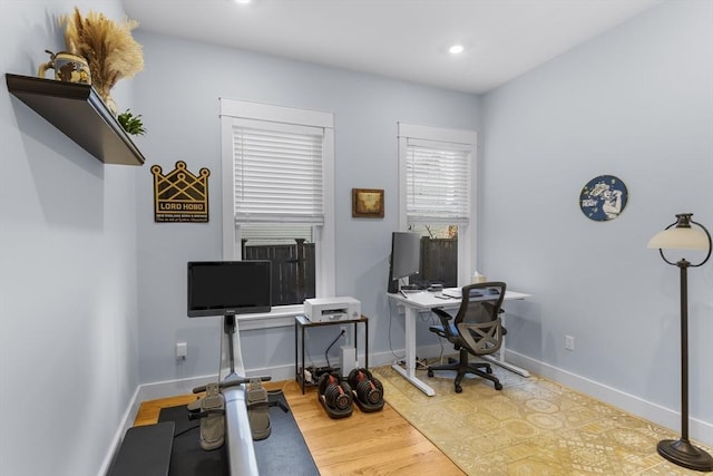 office area with wood-type flooring