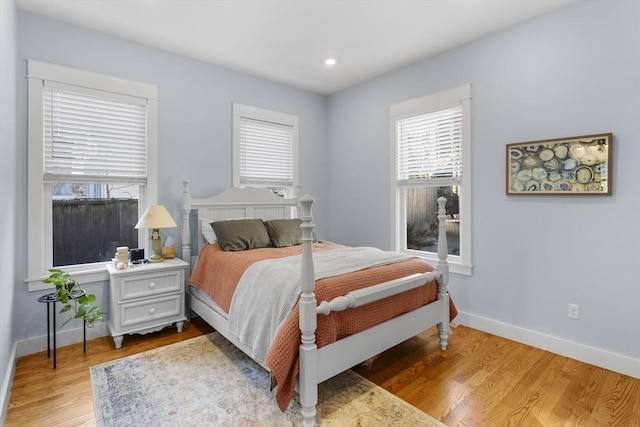 bedroom featuring light wood-type flooring