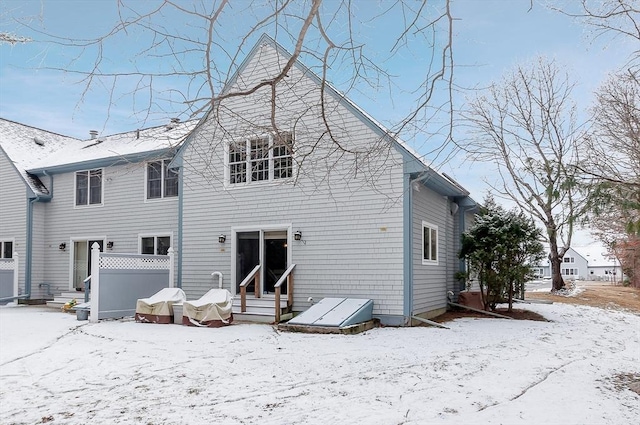 view of snow covered property