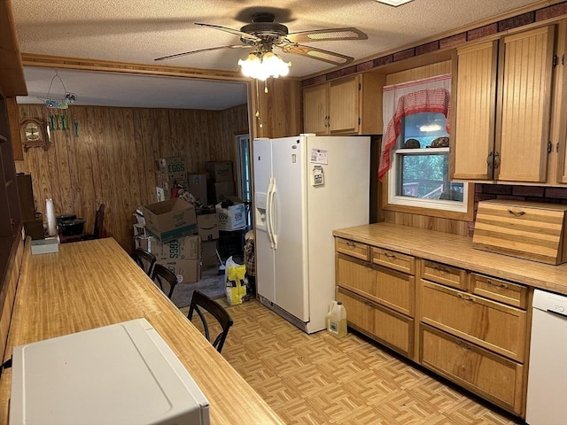 24 Arnold St, Ludlow, MA 01056 - kitchen featuring white appliances, wood walls, ceiling fan, light countertops, and a textured ceiling