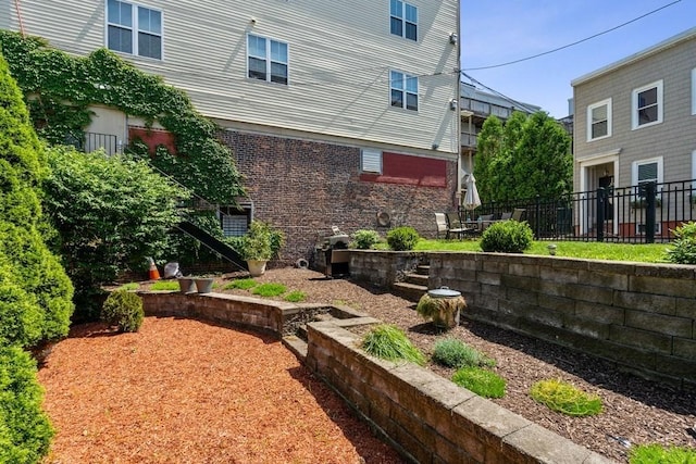 view of yard featuring fence