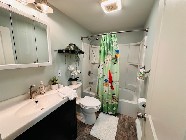 full bathroom featuring wood-type flooring, vanity, toilet, and shower / tub combo