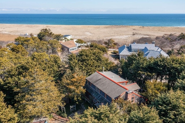 bird's eye view featuring a view of the beach and a water view