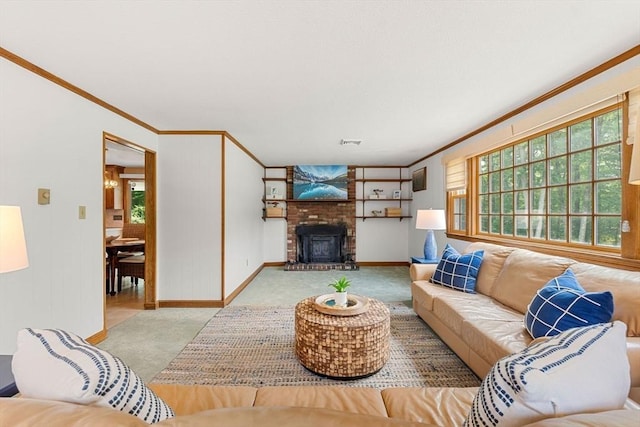 6 Lancaster Pl, Andover, MA 01810 - carpeted living area with ornamental molding, healthy amount of natural light, baseboards, and a brick fireplace
