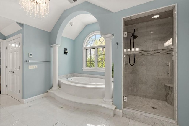 bathroom featuring vaulted ceiling, a garden tub, a stall shower, ornate columns, and baseboards