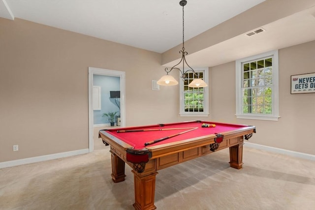 game room with baseboards and light colored carpet