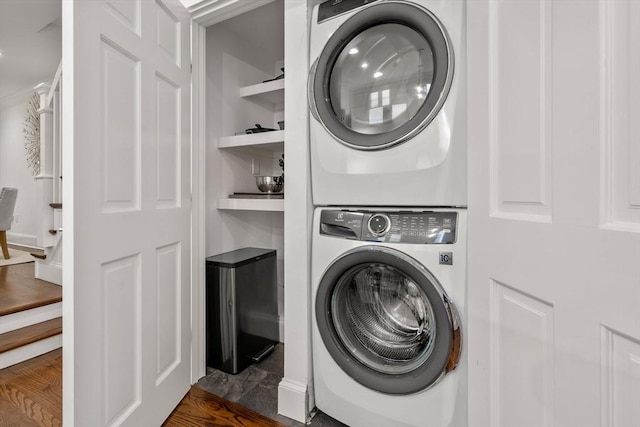 laundry area featuring laundry area and stacked washing maching and dryer