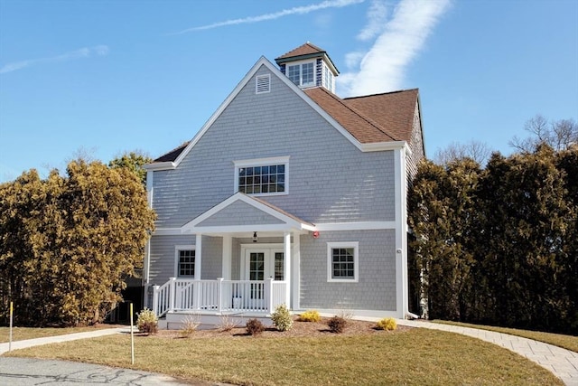 10 Mayfair Ct Unit 10, Mashpee, MA 02649 - view of front facade with covered porch and a front lawn