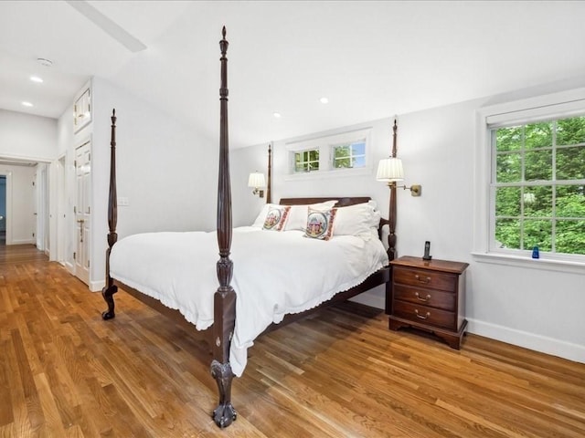 234 Lowell Rd, Wellesley, MA 02481 - bedroom with wood finished floors, baseboards, and lofted ceiling