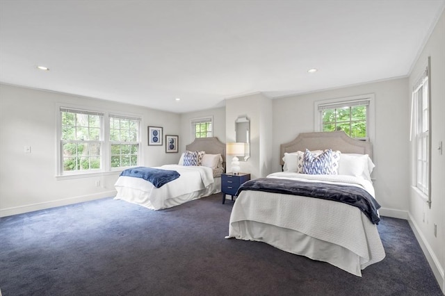 bedroom featuring recessed lighting, baseboards, and carpet