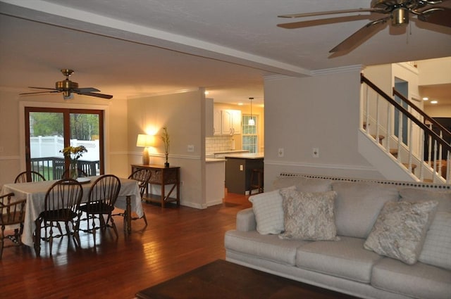 34 Liberty Ln, Ashburnham, MA 01430 - living area featuring a ceiling fan, dark wood-style floors, stairs, baseboards, and crown molding