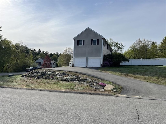 34 Liberty Ln, Ashburnham, MA 01430 - garage with asphalt driveway