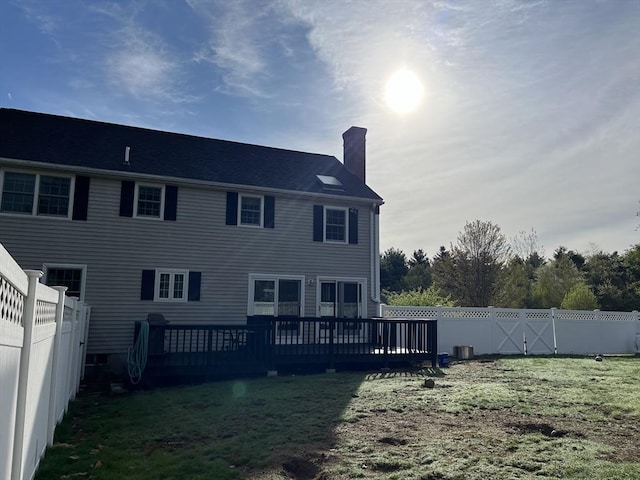 34 Liberty Ln, Ashburnham, MA 01430 - rear view of house with a chimney and a deck