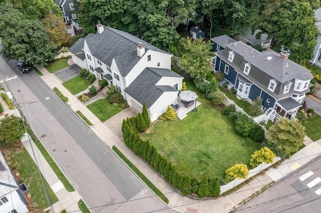 birds eye view of property with a residential view