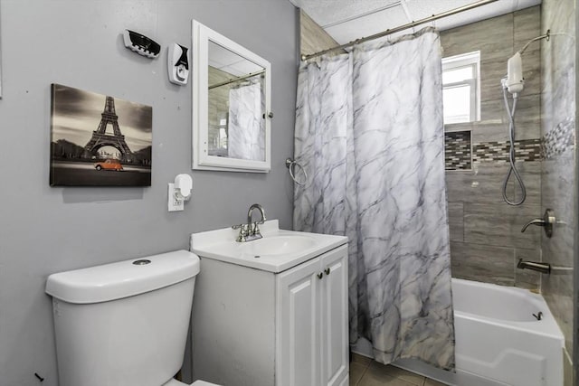 full bath with shower / tub combo, vanity, toilet, and tile patterned flooring