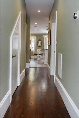 hall featuring dark wood-type flooring