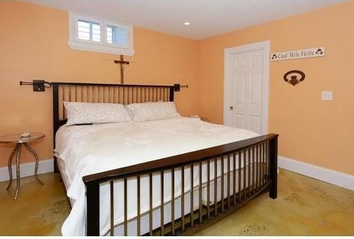 bedroom with light colored carpet