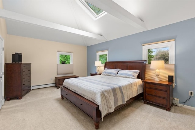 bedroom with a baseboard radiator, light carpet, a skylight, and baseboards