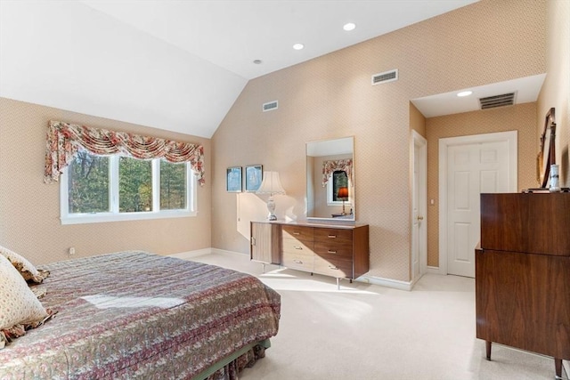 carpeted bedroom featuring vaulted ceiling