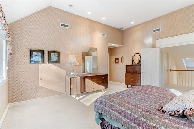 carpeted bedroom featuring lofted ceiling