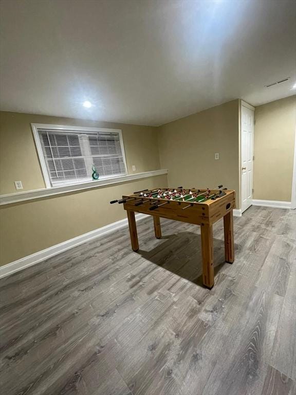 1595 Washington St, East Bridgewater, MA 02333 - playroom with wood finished floors, baseboards, and recessed lighting