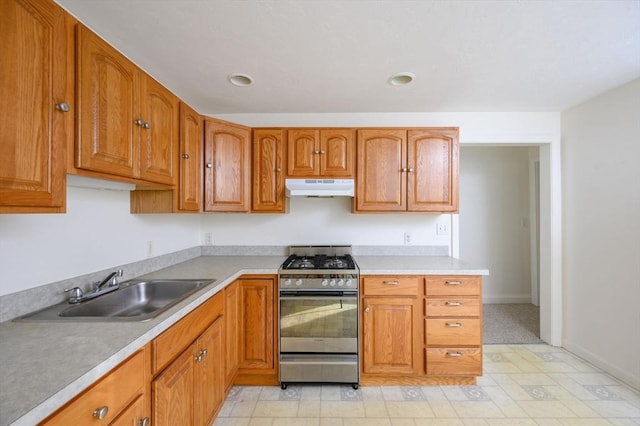 kitchen featuring sink and gas range