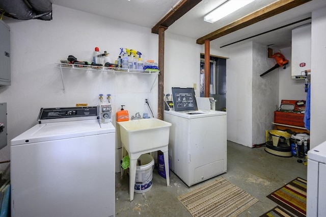 laundry room featuring separate washer and dryer and electric panel