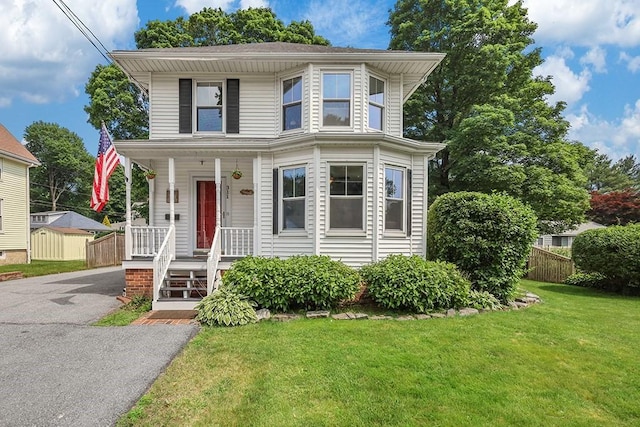 311 Main St, Franklin, MA 02038 - american foursquare style home featuring covered porch and asphalt driveway