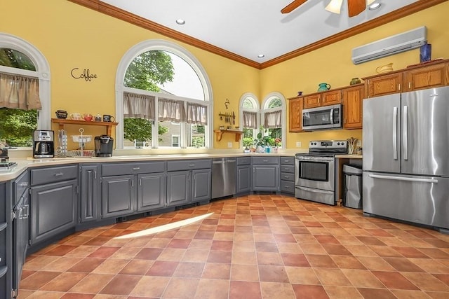 311 Main St, Franklin, MA 02038 - kitchen featuring stainless steel appliances, gray cabinets, ceiling fan, ornamental molding, and a wall mounted AC
