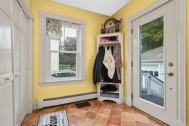 311 Main St, Franklin, MA 02038 - mudroom with baseboard heating, light tile patterned floors, and baseboards