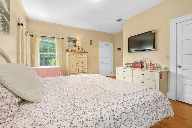 311 Main St, Franklin, MA 02038 - bedroom with crown molding and wood finished floors