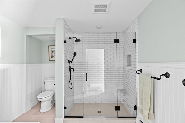 16 W Wind Acres, Norwell, MA 02061 - full bathroom featuring a wainscoted wall, a stall shower, and toilet