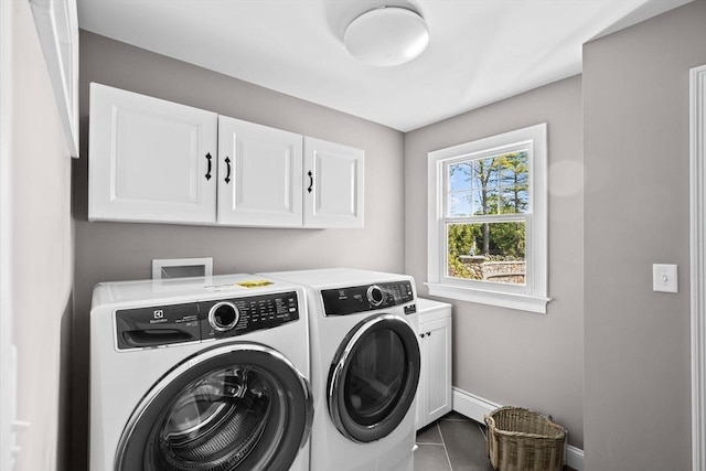 16 W Wind Acres, Norwell, MA 02061 - laundry area featuring cabinet space, independent washer and dryer, baseboards, and dark tile patterned floors