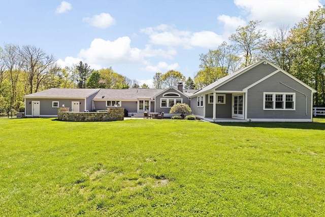 16 W Wind Acres, Norwell, MA 02061 - back of house with a yard and a chimney