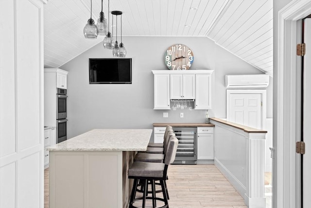 16 W Wind Acres, Norwell, MA 02061 - bar area featuring wine cooler, an AC wall unit, vaulted ceiling, light wood-style floors, and wood ceiling