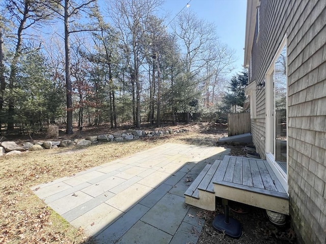 view of patio / terrace featuring fence