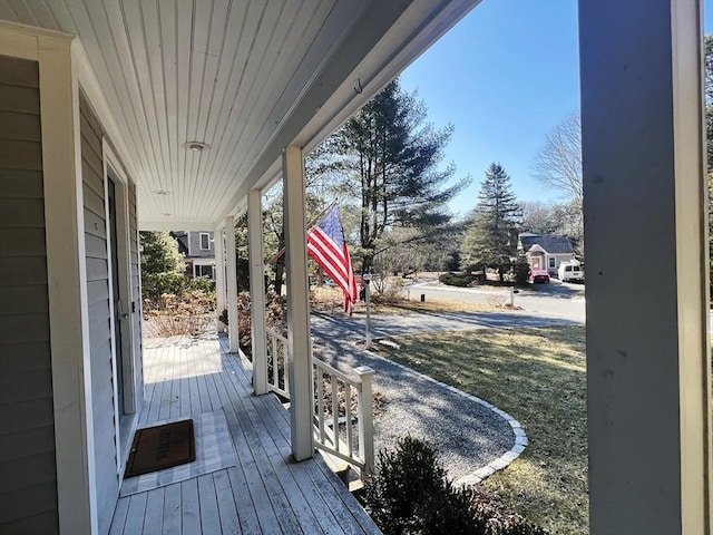 wooden deck featuring covered porch