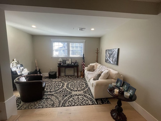 living room with wood-type flooring