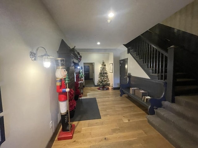 corridor featuring light hardwood / wood-style floors