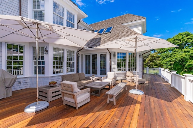 deck with an outdoor hangout area