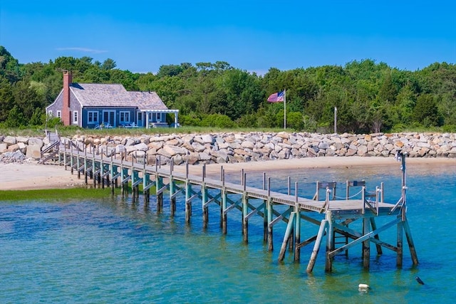 dock area with a water view