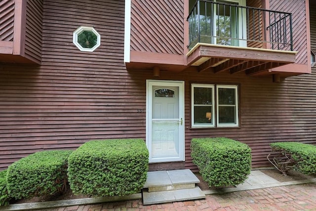 330 Thurston St Unit 330, Wrentham, MA 02093 - view of exterior entry featuring a balcony