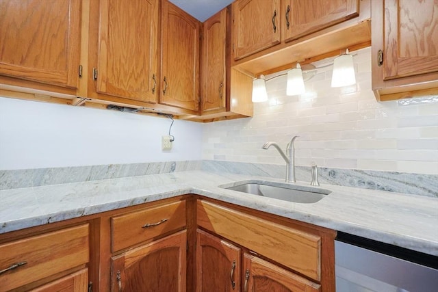 330 Thurston St Unit 330, Wrentham, MA 02093 - kitchen with tasteful backsplash, dishwasher, brown cabinetry, and light stone countertops
