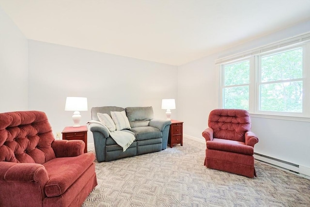 330 Thurston St Unit 330, Wrentham, MA 02093 - living area with light colored carpet and a baseboard heating unit