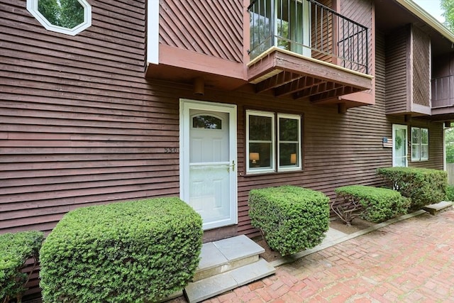 330 Thurston St Unit 330, Wrentham, MA 02093 - view of exterior entry with a balcony