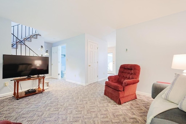 330 Thurston St Unit 330, Wrentham, MA 02093 - carpeted living area with stairway and baseboards