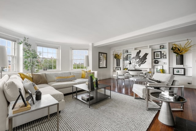 living room featuring crown molding and wood-type flooring